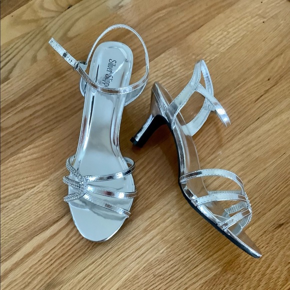 Strappy silver shoes with rhinestones
Heel is 2.75” H - Picture 4 of 5